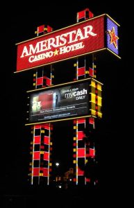 Lighted monument pole sign with digital message center and display